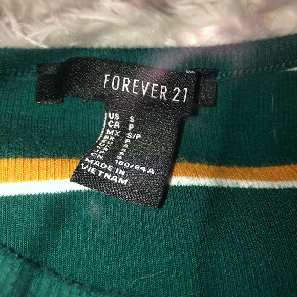 Stretchy form fitting crop top. - Picture 1 of 3